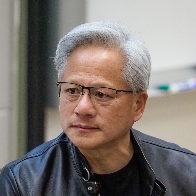 Jensen Huang in a black leather jacket during a fireside chat at Stanford University in April 2026