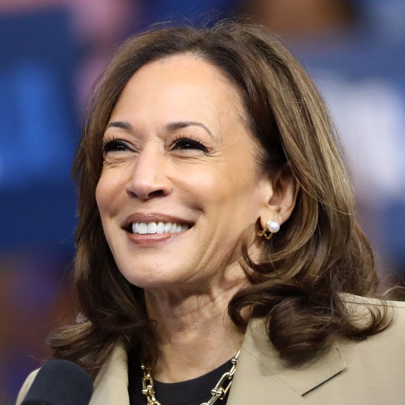 Kamala Harris smiling at a rally in Glendale, Arizona, in August 2024